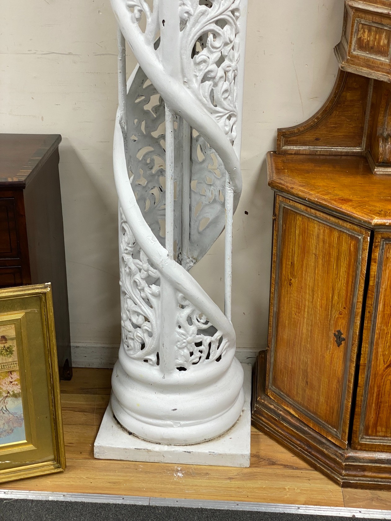A pair of large white painted fibre glass helical columns, height 239cm